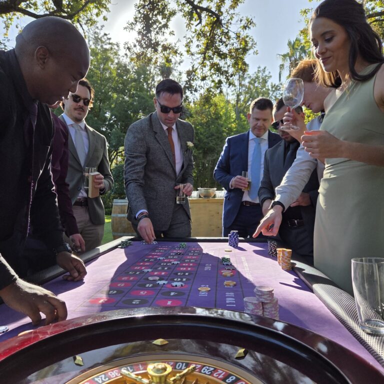 Guests at a casino table during anniversary parties (2)