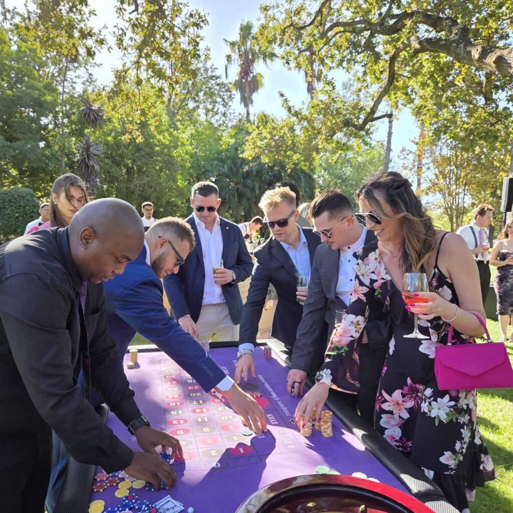 Guests at a casino table during anniversary parties